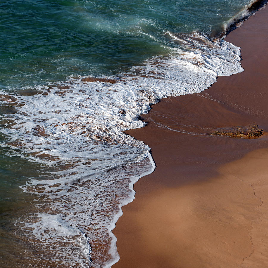 Nature Photograph - Waves On A Red Sand Beach by Julio Lopez Saguar