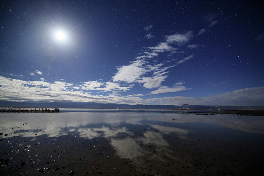 Waxing Moon Shining Above The Salt Lake Photograph by Jeff Dai