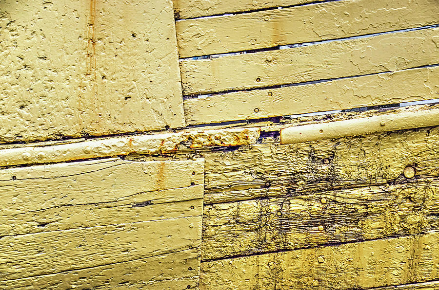Weathered yellow ships hull Photograph by Frans Blok