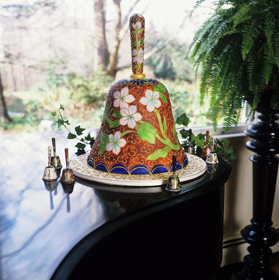 Wedding Bell Cake On A Platter Surrounded By Wedding Bells Photograph by Cooke, Colin