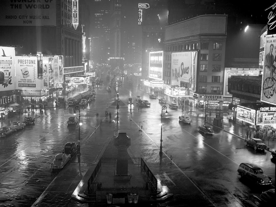 Wet Roads Reflect The Glitter Of Lights Photograph by New York Daily News Archive