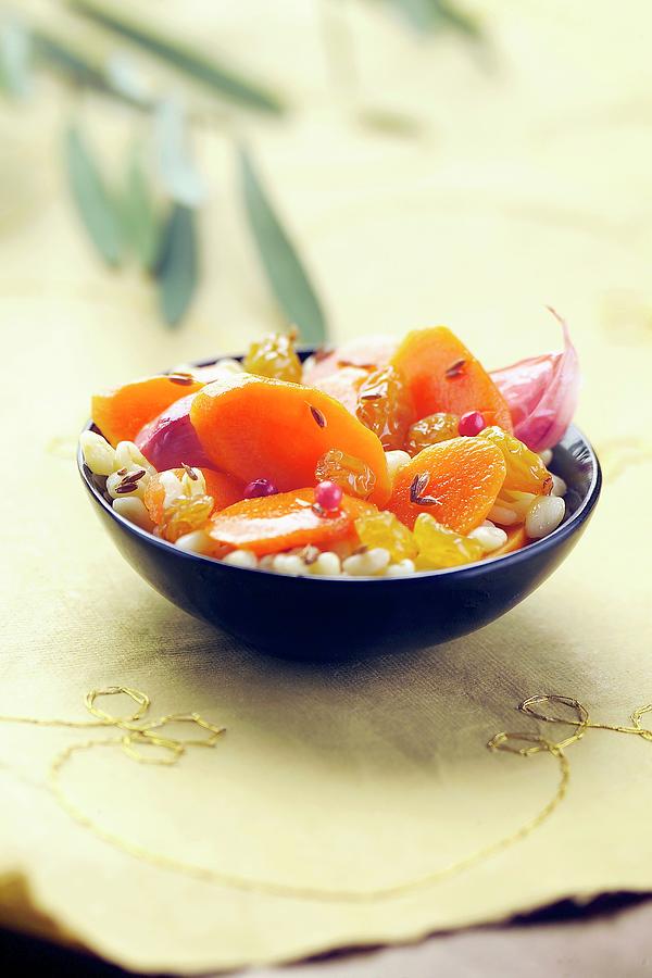 Wheat, Carrot, Garlic And Raisin Salad Photograph by Lorthios