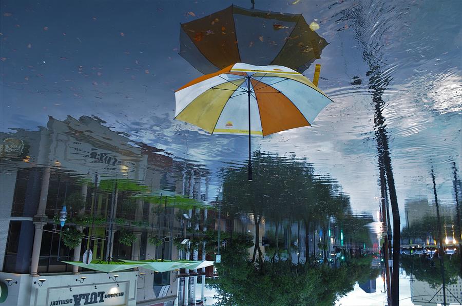 When It Rains It Floods And Everything Turns Upside Down In New Orleans Photograph by Michael Hoard