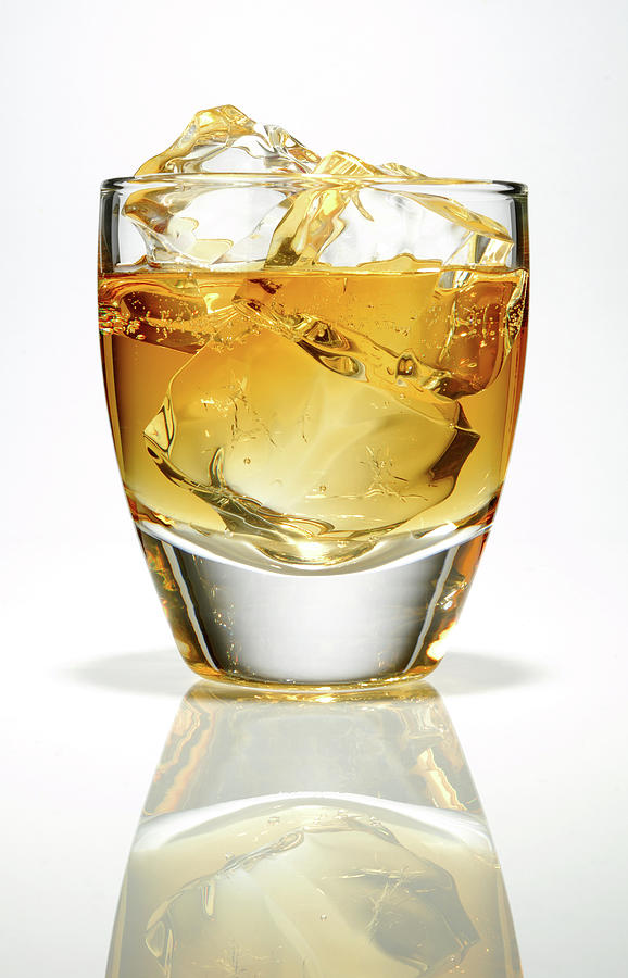 Whiskey In Glass Photograph by Nicholas Eveleigh