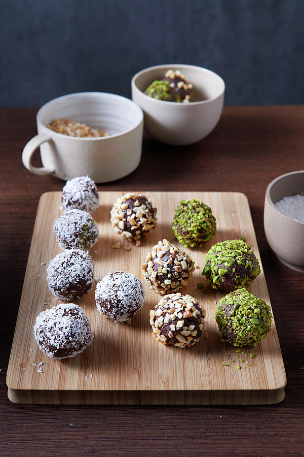 Whiskey Orange Balls With Coconut, Pistachios And Almonds Photograph by Nikolai Buroh