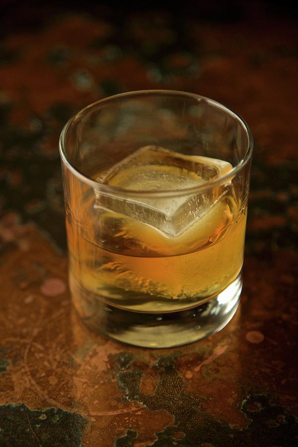 Whisky On The Rocks Photograph by Andre Baranowski