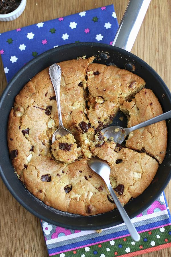 White And Dark Chocolate Chip One Pan Cake Photograph by Desgages