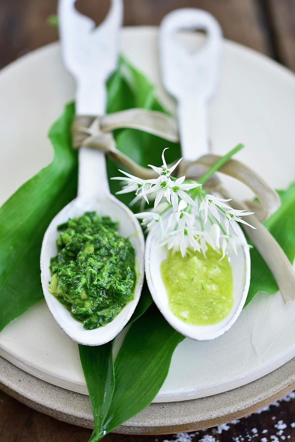 White And Green Garlic Pesto On Spoons Photograph by Tanja Major