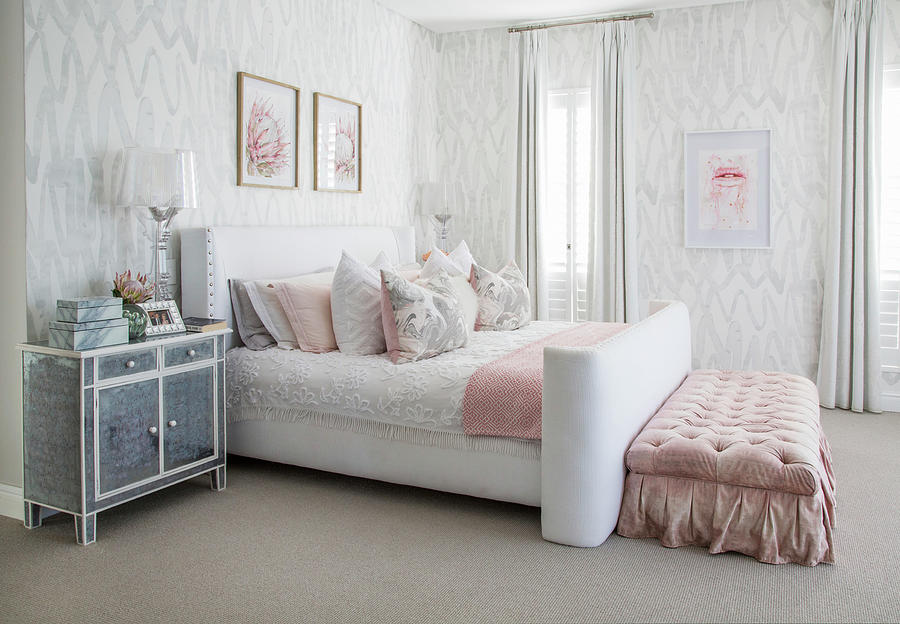 White-and-grey Bedroom With Pink Accents And Button-tufted Bed Bench Photograph by Great Stock!