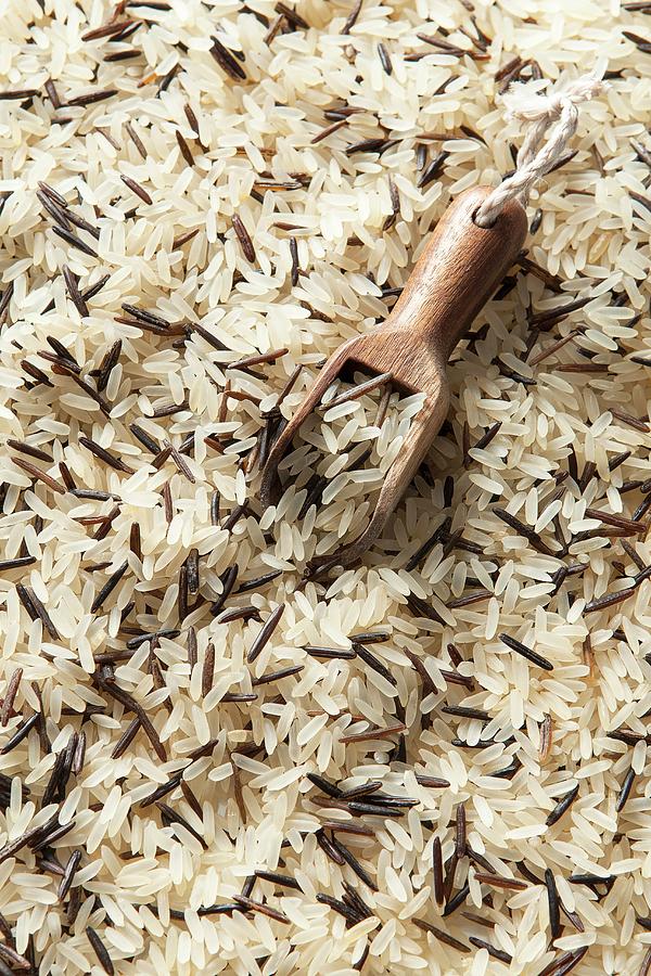 White And Wild Rice With Wooden Scooper seen From Above Photograph by Stacy Grant