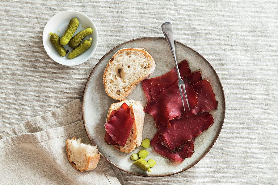 White Bread With Grisons Air-dried Beef And Gherkins Photograph by Veronika Studer