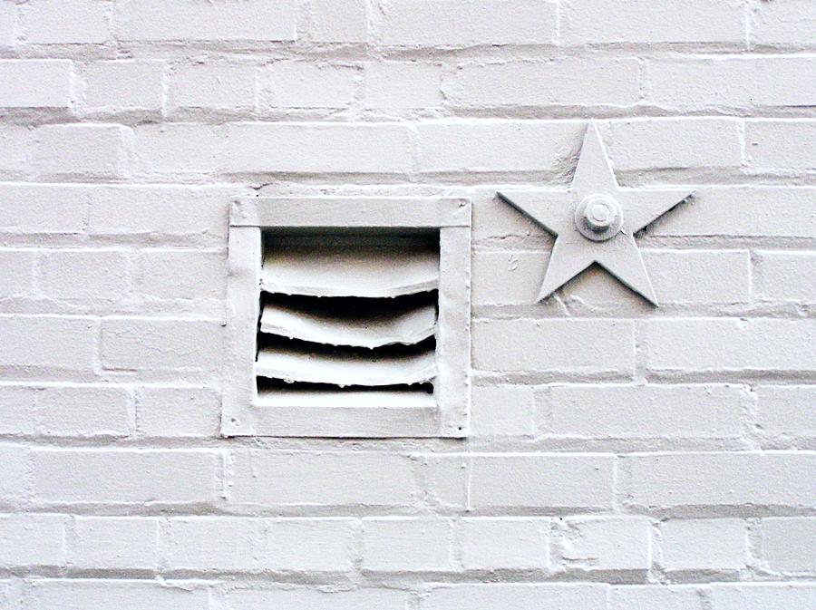 White Brick Wall With Vent And Star Photograph by Linus Gelber / Alert The Medium