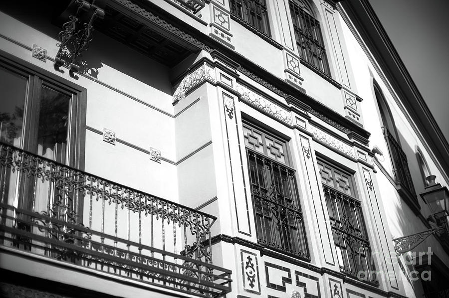 White Building Style in Seville Photograph by John Rizzuto
