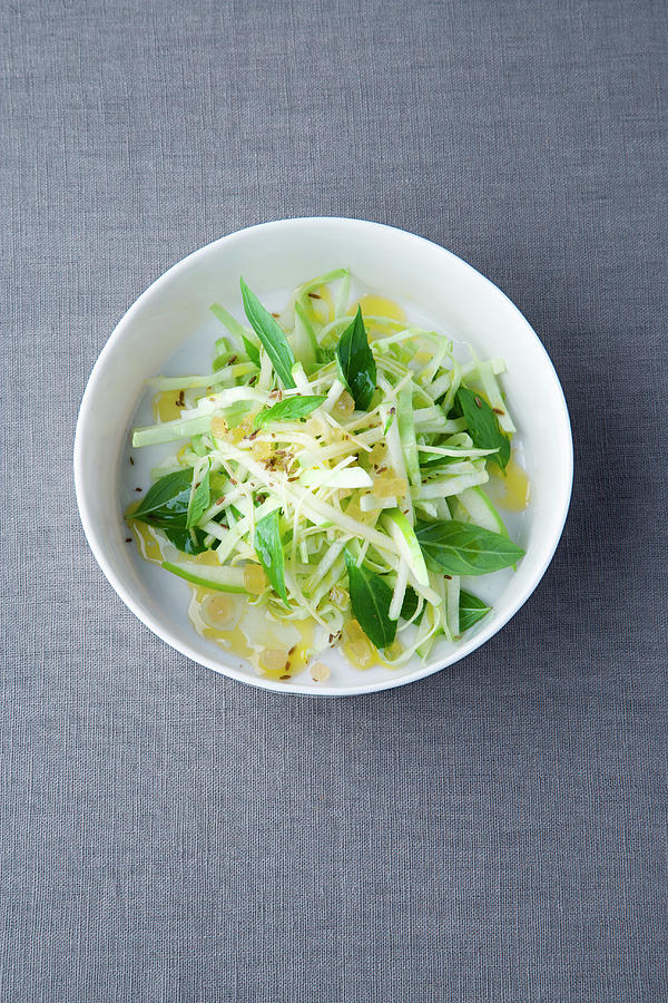 White Cabbage And Apple Salad With Cumin And Thai Basil Photograph by Michael Wissing