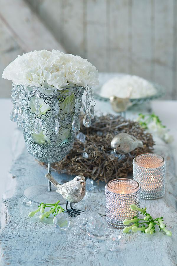 White Carnations In Goblet With Crystal Droplets, Bird Ornaments And Tealight Holders Photograph by Alena Hrbkov