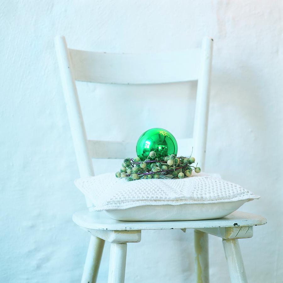 White Chair With Cushion And Christmas Decor Photograph by Klaus-maria Einwanger