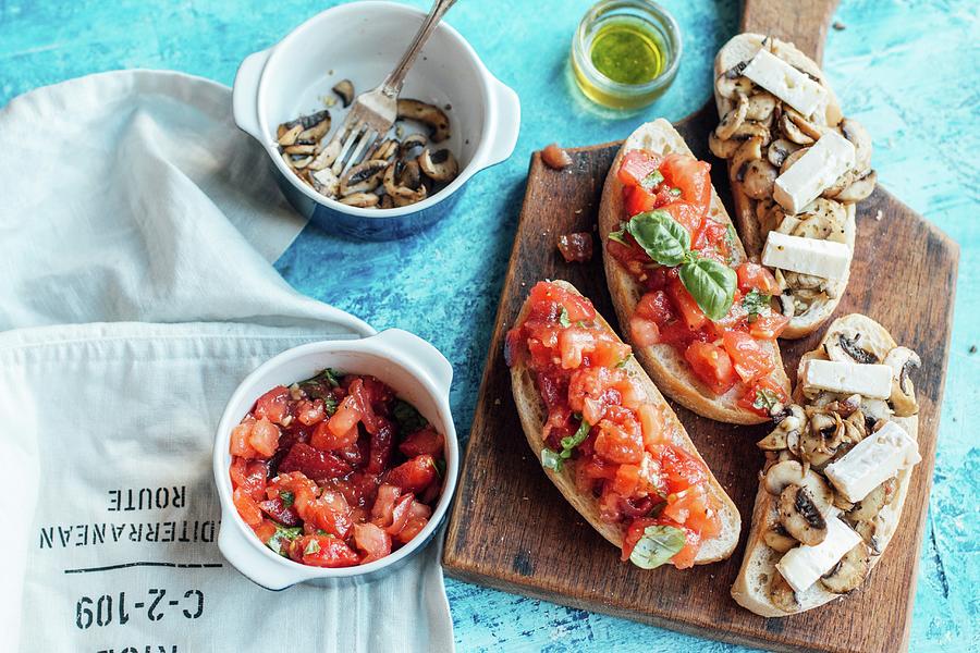 White Chiabatta Bread Cut With Toppings, Tomato And Mushrooms With Brie ...