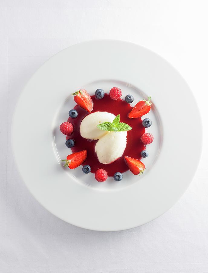 White Chocolate Mousse With Berry Sauce Photograph by Michael Ruder