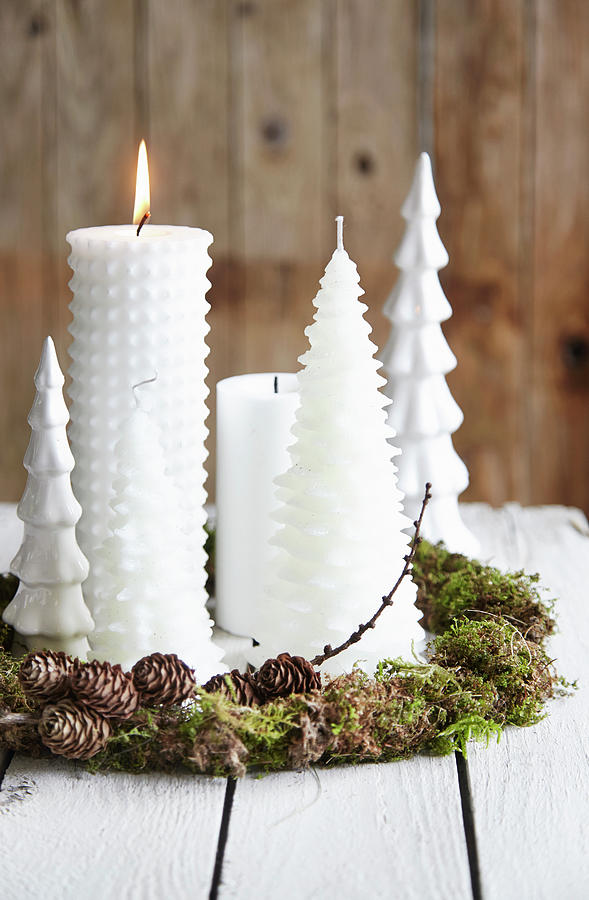 White Christmas Candles In Handmade Wreath Of Moss And Larch Twigs Photograph by Nicoline Olsen