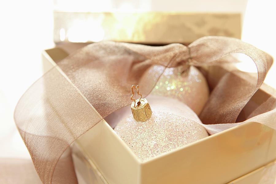 White Christmas Tree Baubles Photograph by Anneliese Kompatscher