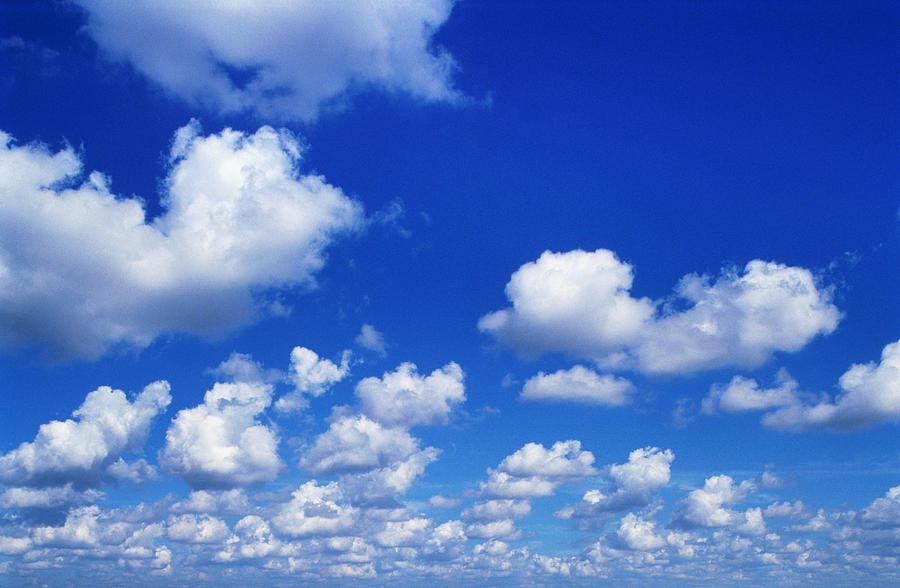 White Clouds In Blue Sky Photograph by Doug Armand