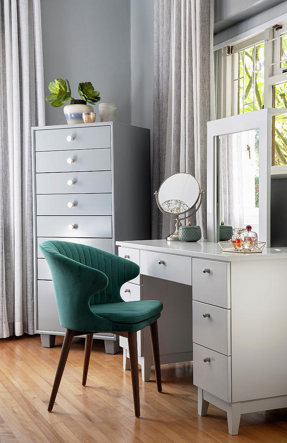 White Dressing Table And Petrol-blue Velvet Chair Next To Tallboy Photograph by Great Stock!