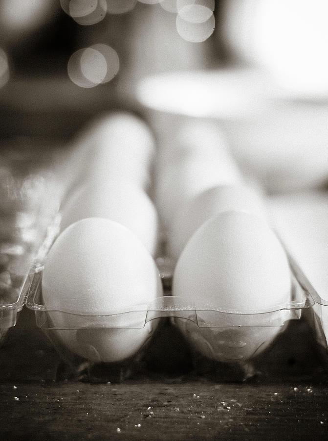White Eggs In A Transparent Egg Holder close-up Photograph by Eising Studio
