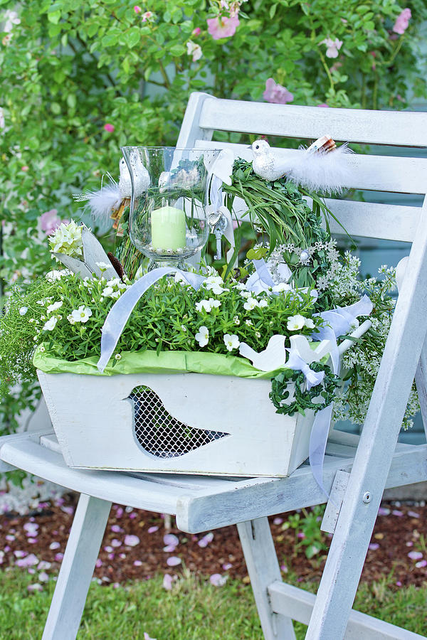 White-flowering Plants Planted In Wooden Basket As Wedding Present Photograph by Angelica Linnhoff