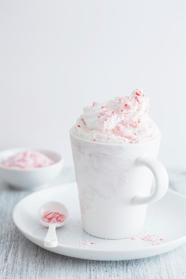 White Hot Chocolate With Candy Cane Photograph by Olga Miltsova