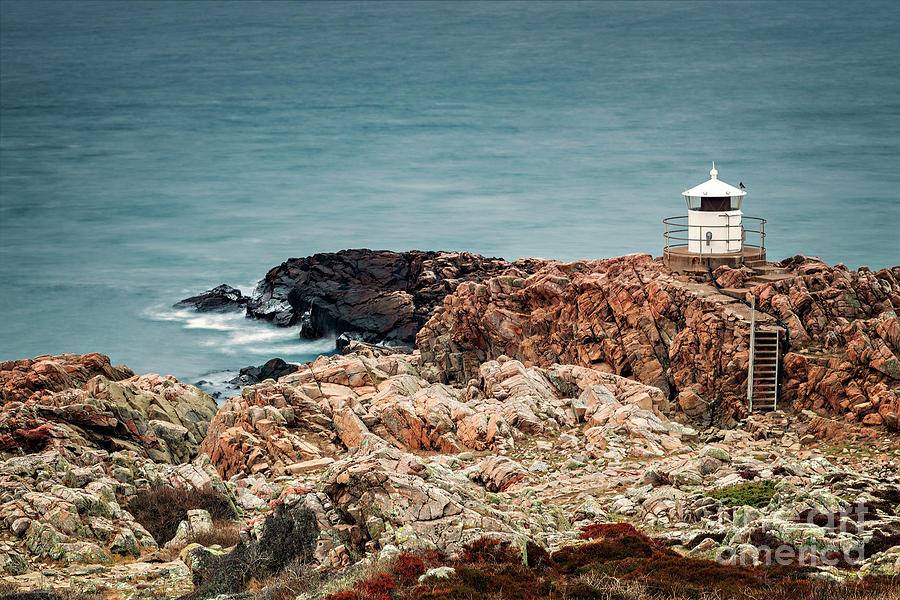 White lighthouse on cliffs Photograph by Sophie McAulay