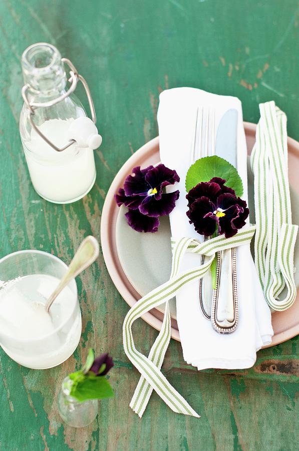 White Linen Napkin With Cutlery And Pansies Photograph by Cornelia Weber