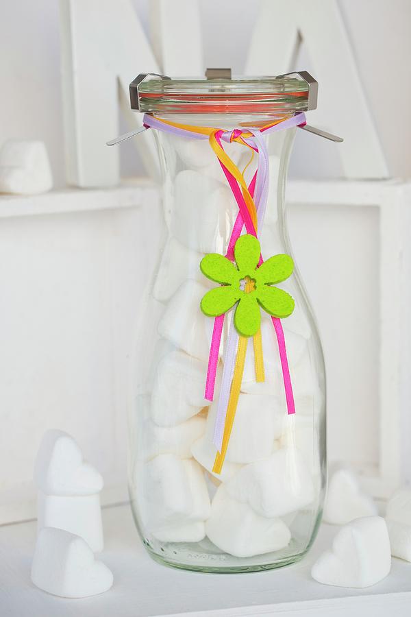 White Marshmallow Hearts In Glass Bottle Decorated As Gift Photograph by Esther Hildebrandt