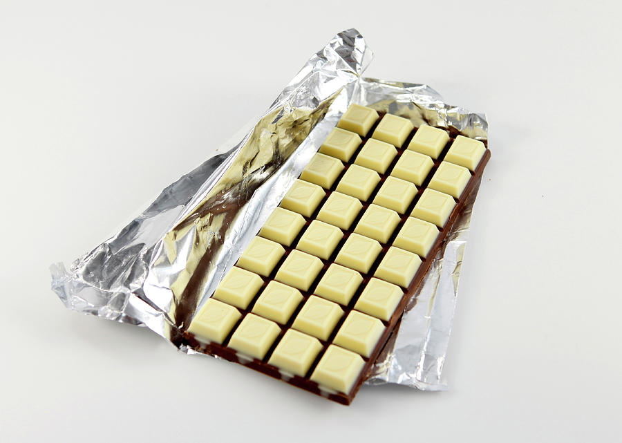 White Milk Chocolate Bar On Silver Foil On White Background Photograph by Jalag-fotostudio,