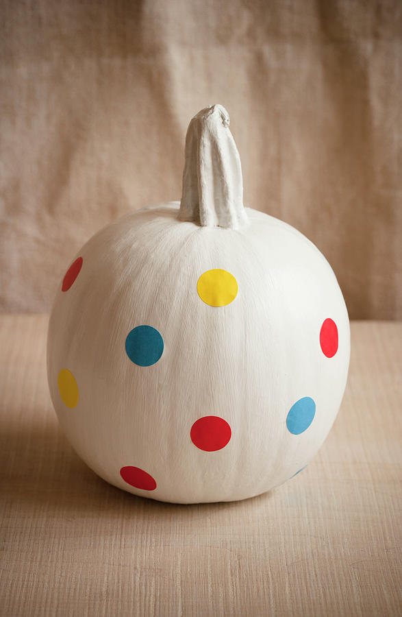 White-painted Pumpkin Decorated With Polka-dot Stickers Photograph by Colin Cooke