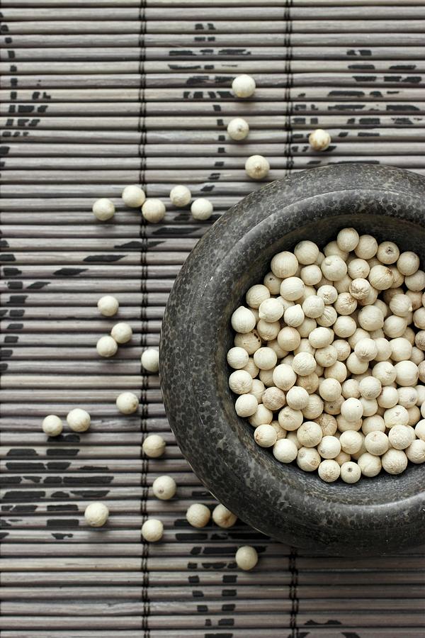 White Peppercorns In A Mortar Photograph by Petr Gross