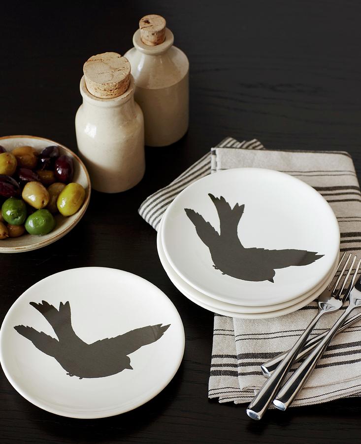 White Plates With Black Bird Silhouettes On Striped Napkins Photograph by Cedric Glasier Photography