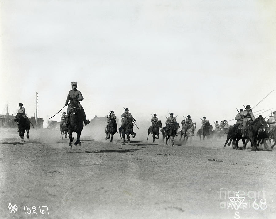 White Russian Troops Advance On Horses Photograph by Bettmann