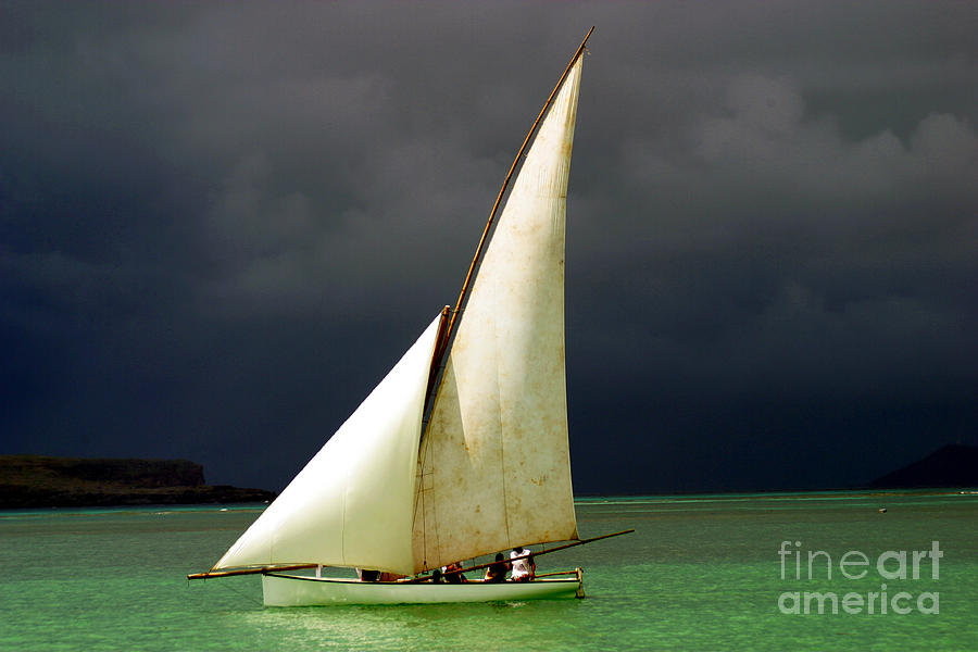 Sailboat Photograph - White Sailed Pirogue On The Ocean by Paul Banton Sailboat Photograph - White Sailed Pirogue On The Ocean by Paul Banton