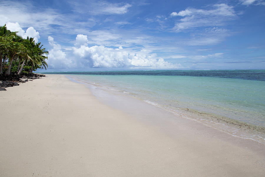Holiday Photograph - White Sand Beach And Clear Blue Calm Waters Of Samoa by Cavan Images