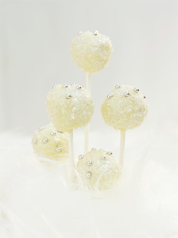 White Snowball Cake Pops With Silver Balls Photograph by Garlick, Ian