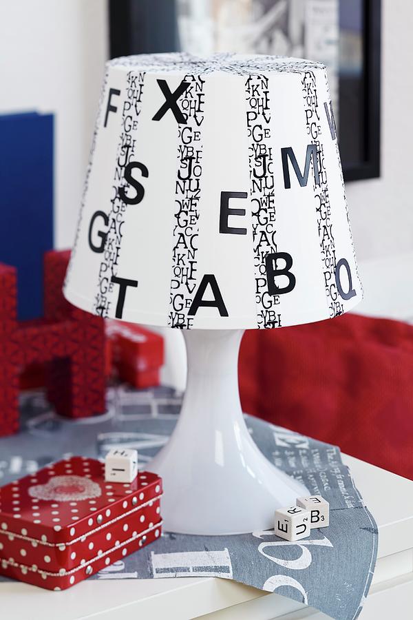 White Table Lamp Decorated With Black Letters And Washi Tape Photograph by Franziska Taube