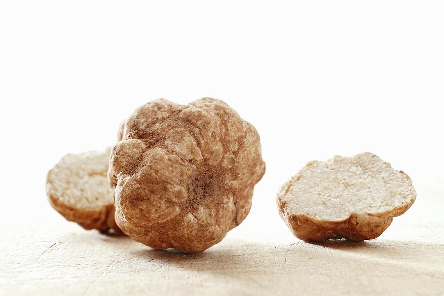White Truffles, Whole And Halved Photograph by Petr Gross