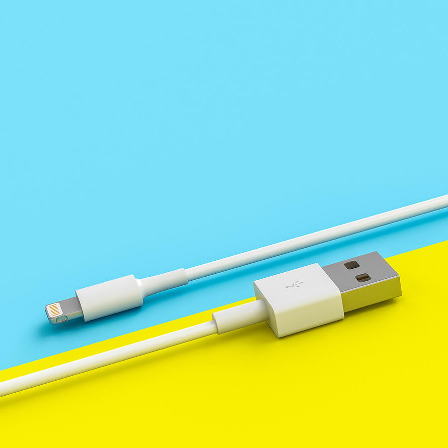 Device Photograph - White Usb Cable On Yellow And Blue Background  by Gualtiero Boffi