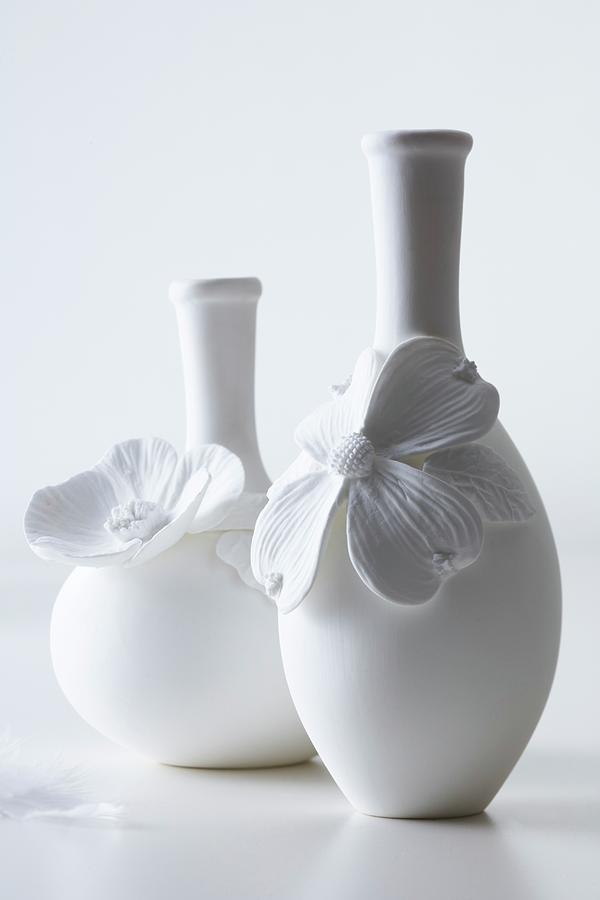 White Vases Decorated With Flowers Photograph by Franziska Taube