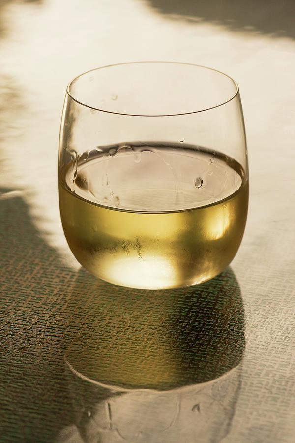 White Wine In A Glass Photograph by William Boch