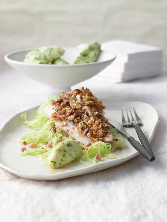 Whitefish Fillet With A Light Nut Crust On Bavarian Cabbage With Semolina Dumplings Photograph by Jan-peter Westermann