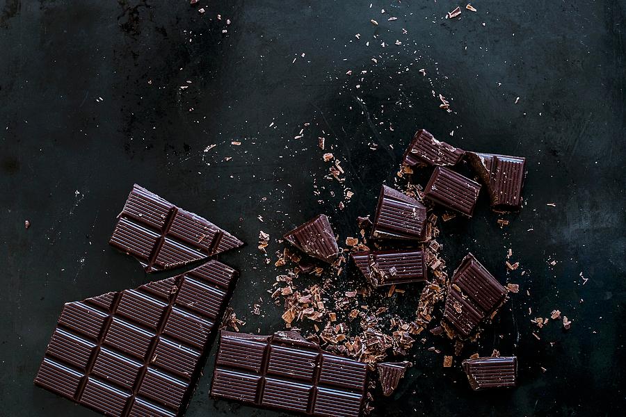 Whole And Chopped Squares Of Chocolate Photograph by Maricruz Avalos Flores