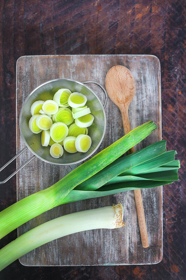 Whole Leeks And Cut Into A Pan Photograph by Claudia Gargioni