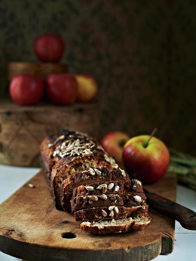 Wholemeal Bread With Apples And Sunflower Seeds Photograph by Hannah Kompanik