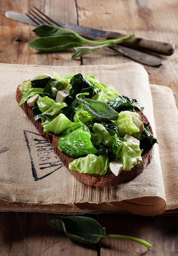 Wholemeal Bread With Tofu, Sage And Green Vegetables Photograph by Blueberrystudio